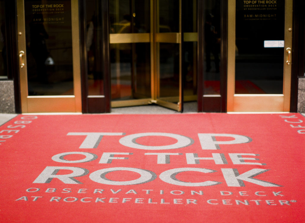 The iconic red carpet outside the entrance to the Top of the Rock photographed by You Look Lovely Photography
