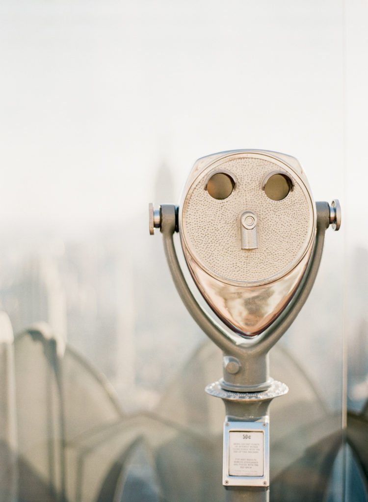 The coin operated binoculars on the Observation Deck at the Top of the Rock during sunset photographed by You Look Lovely Photography