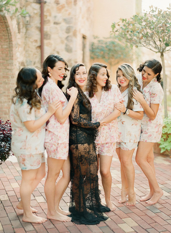 Bride and her bridesmaids in their getting ready wear for a Bella Collina wedding photographed by You Look Lovely Photography