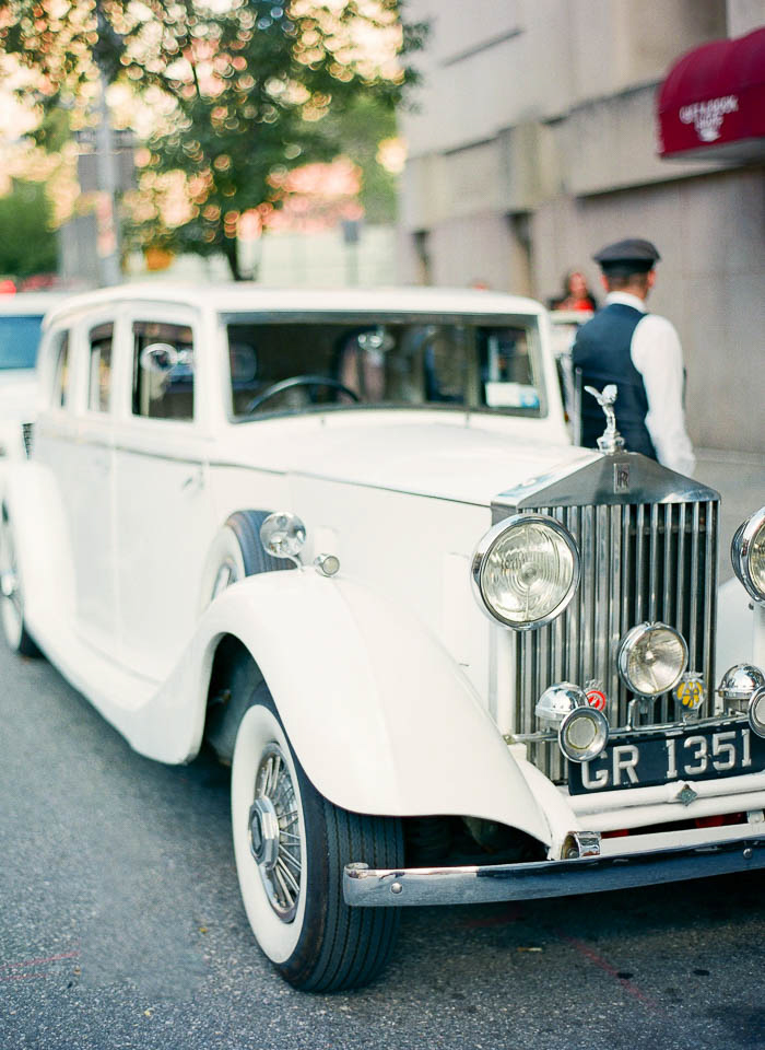 A Rolls Royce wedding car waiting for the bride and groom photographed by You Look Lovely Photography